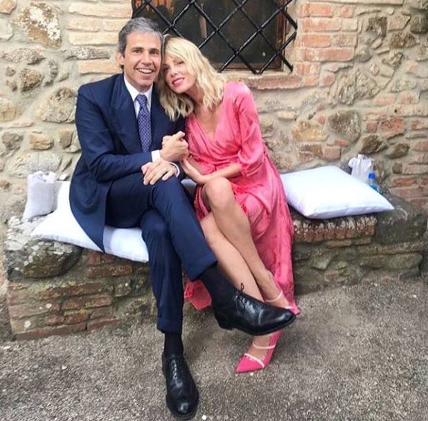 Alessia Marcuzzi in compagnia del marito al matrimonio di Simone Inzaghi.